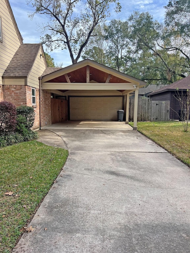 exterior space with a yard and a carport