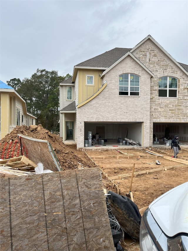 view of front of property with a garage