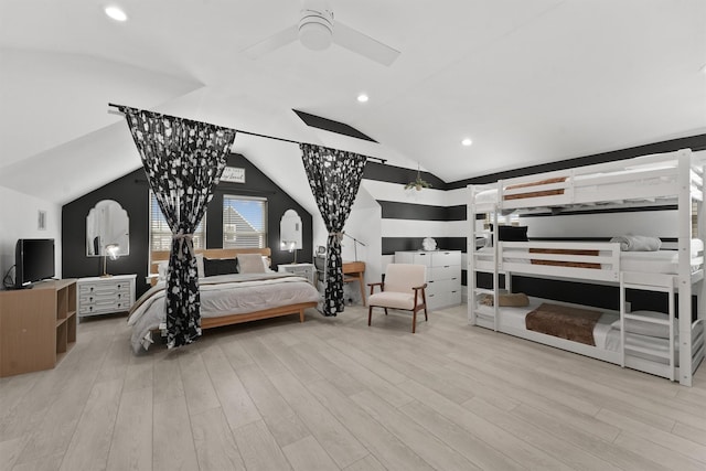 bedroom featuring ceiling fan, vaulted ceiling, and light wood-type flooring