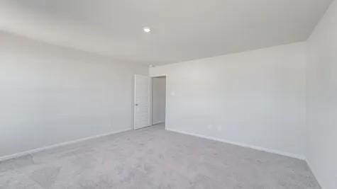 355 E Northpointe Ave, La Grange, TX 78945 - carpeted spare room featuring baseboards