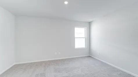 empty room with light carpet