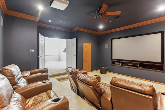 home theater with carpet flooring, ceiling fan, and crown molding