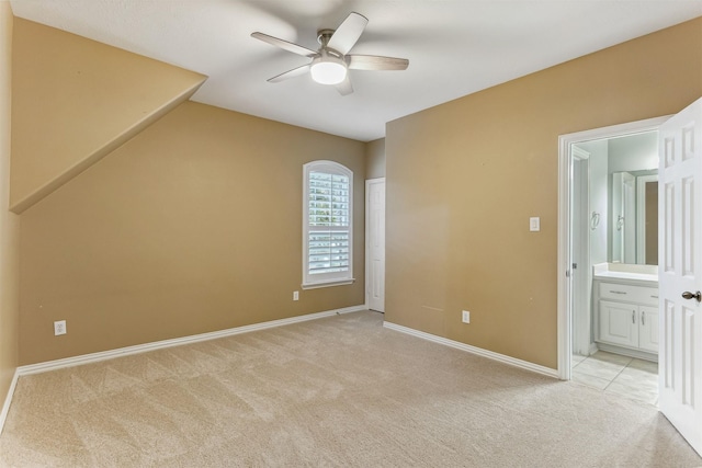 interior space with ceiling fan