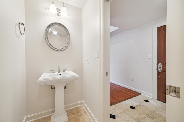 bathroom with tile patterned flooring