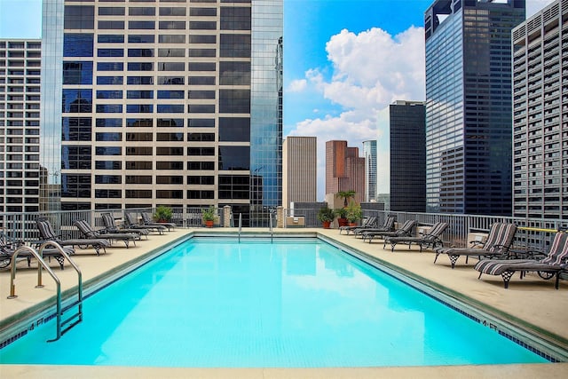 view of swimming pool featuring a patio