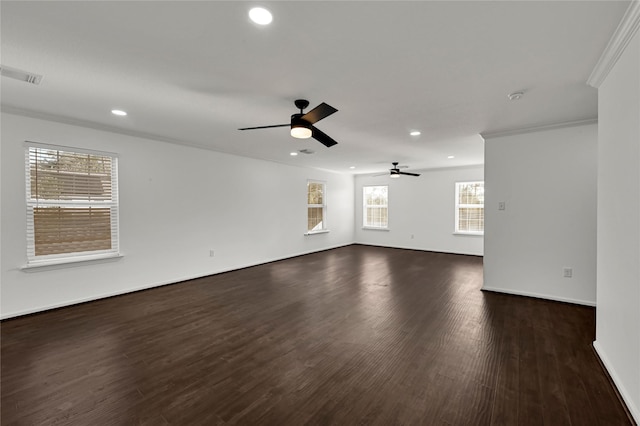 unfurnished room featuring crown molding, dark hardwood / wood-style flooring, and ceiling fan