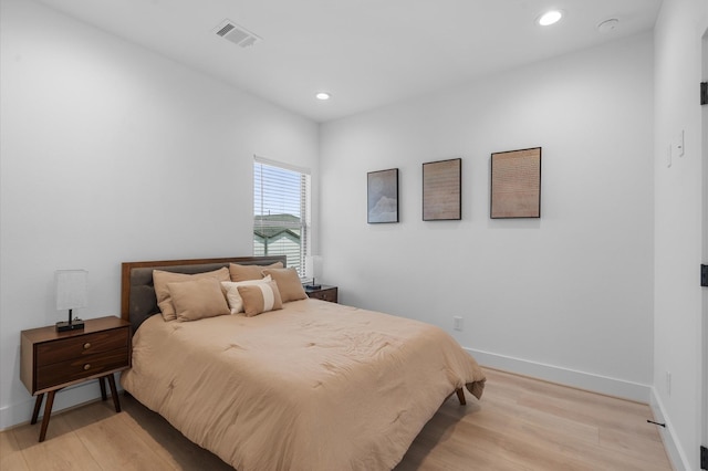 bedroom featuring light hardwood / wood-style floors