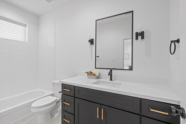 full bathroom featuring shower / bathing tub combination, vanity, and toilet