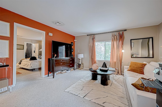 living room with light colored carpet