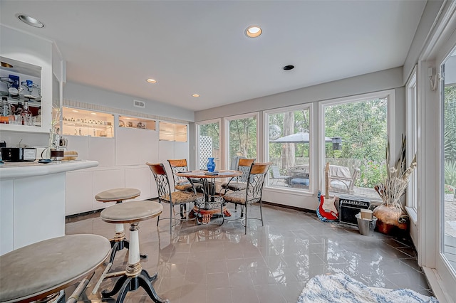 interior space featuring light tile patterned floors