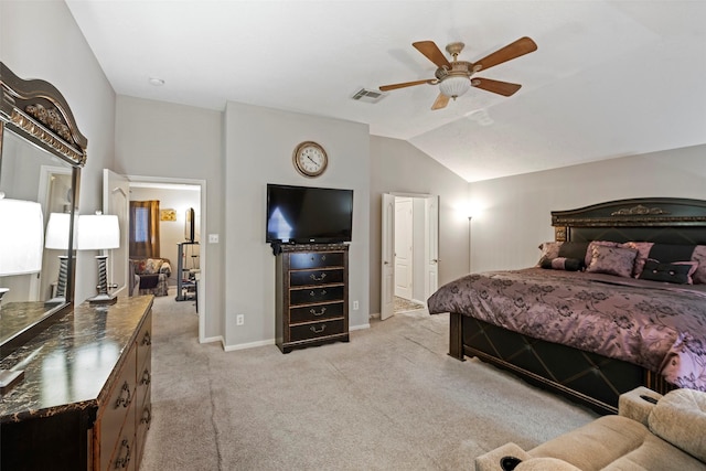 bedroom with light carpet, vaulted ceiling, and ceiling fan