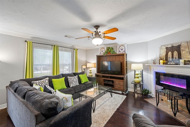 living room featuring ornamental molding, a textured ceiling, and dark wood-type flooring