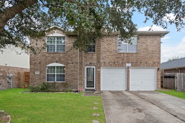 view of front of house featuring a front lawn and a garage