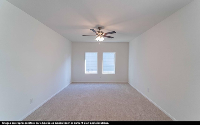 unfurnished room featuring ceiling fan and light colored carpet