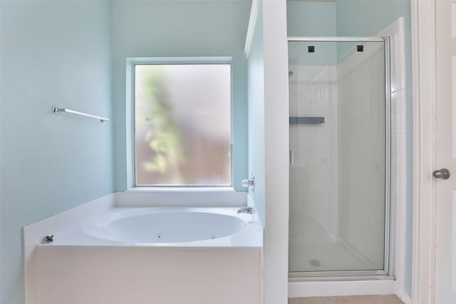 bathroom with independent shower and bath