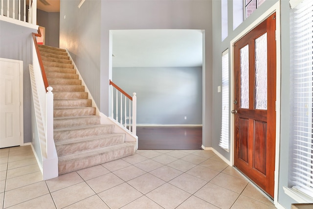 entryway featuring light tile patterned floors