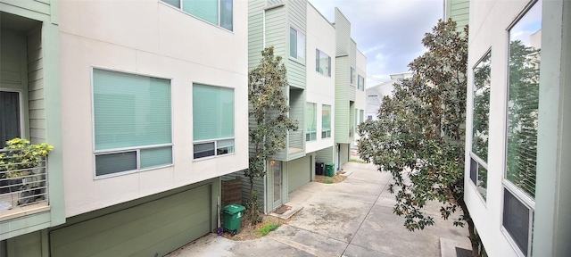 view of property exterior with cooling unit