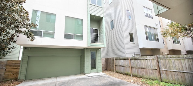 view of side of property featuring a garage