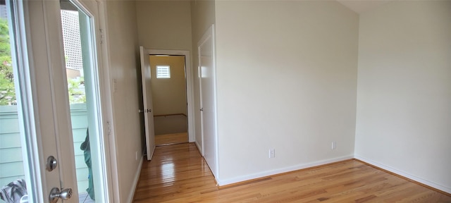 corridor featuring light hardwood / wood-style flooring