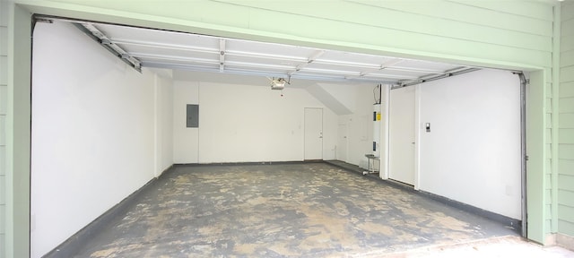 garage with electric panel and a garage door opener