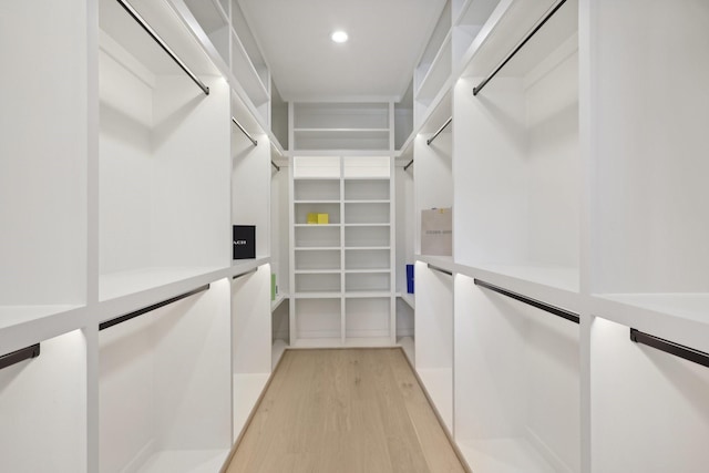 walk in closet featuring light wood-type flooring