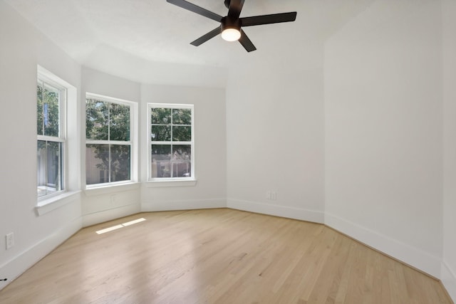 unfurnished room featuring light hardwood / wood-style floors and ceiling fan