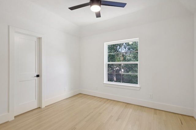 spare room featuring light hardwood / wood-style flooring and ceiling fan