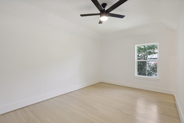 empty room featuring ceiling fan and light wood-type flooring