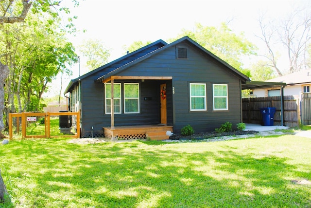 bungalow featuring a front yard