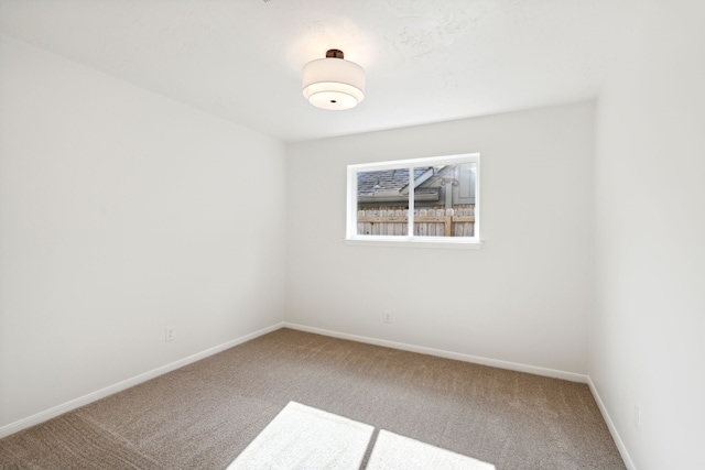 empty room featuring carpet flooring