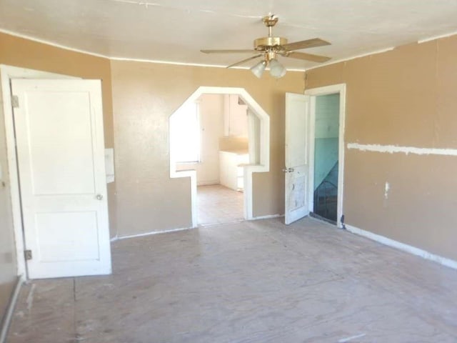 spare room with ceiling fan