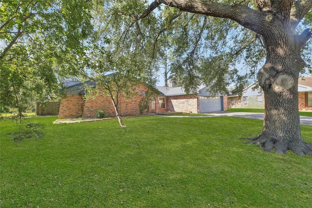 view of yard with a garage