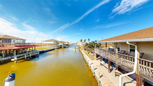 dock area with a water view