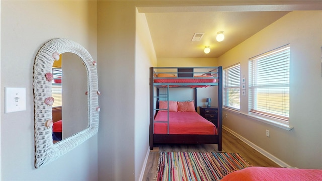 bedroom featuring wood-type flooring