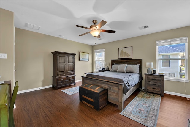 bedroom featuring dark hardwood / wood-style flooring and ceiling fan