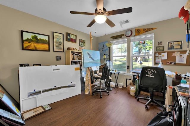 office space featuring wood-type flooring and ceiling fan