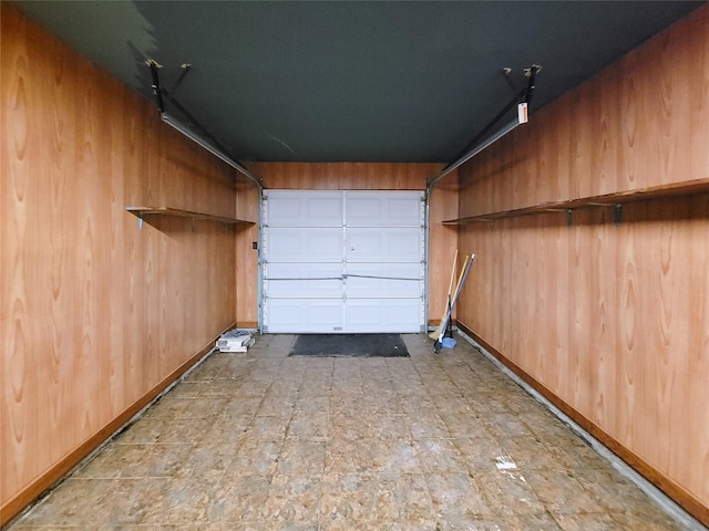 garage with wood walls