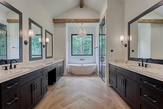 bathroom featuring vanity, plus walk in shower, lofted ceiling with beams, and an inviting chandelier