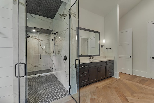 bathroom with vanity and an enclosed shower