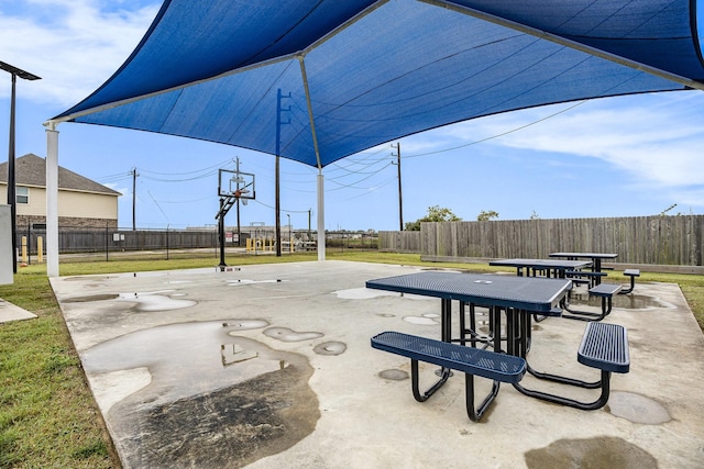 view of patio / terrace featuring basketball hoop