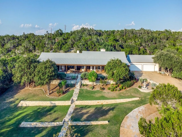 ranch-style house featuring a front lawn