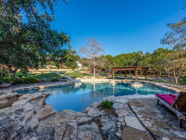 view of pool with a pergola