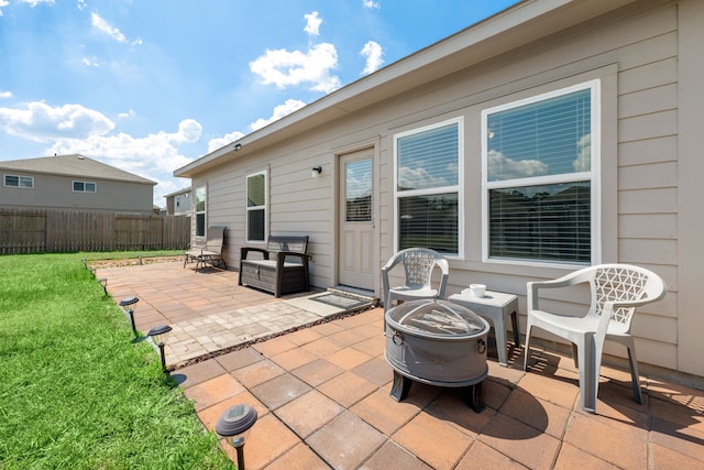 view of patio featuring an outdoor fire pit