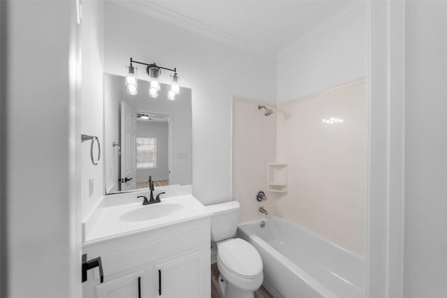 full bathroom featuring vanity, ceiling fan, toilet, ornamental molding, and shower / bathtub combination