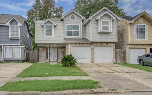 view of front facade with a front lawn and a garage