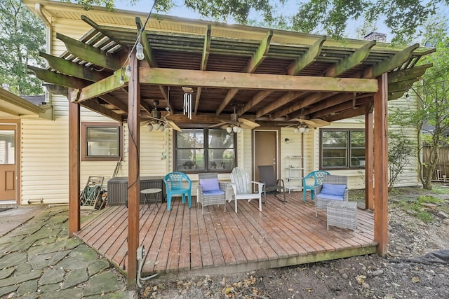 deck with a pergola and ceiling fan