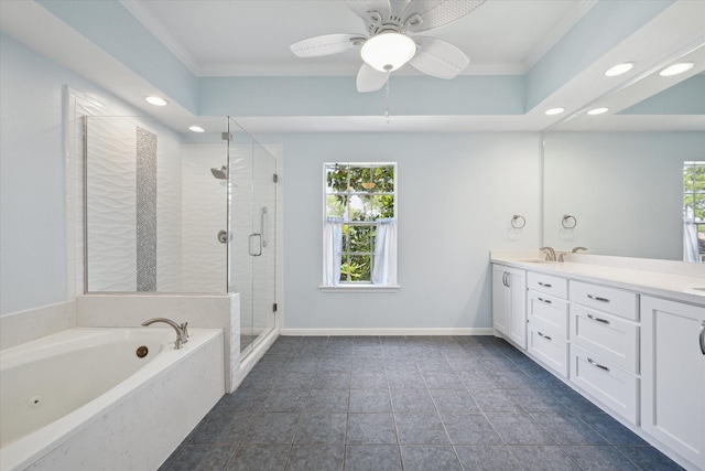 bathroom featuring double vanity, a bath, crown molding, a shower stall, and a sink