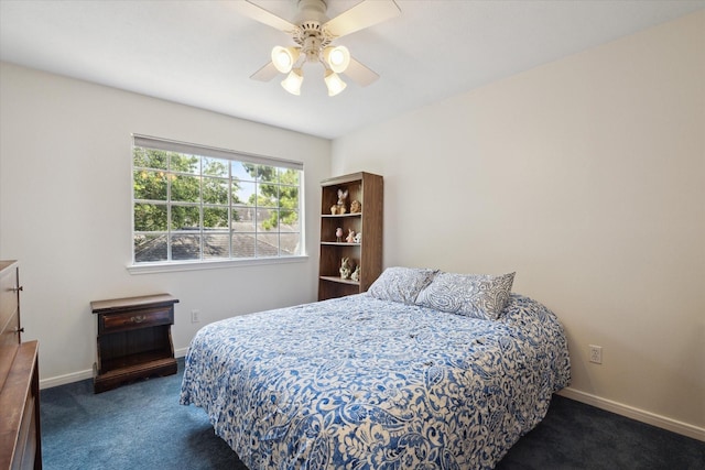 bedroom with ceiling fan, carpet, and baseboards