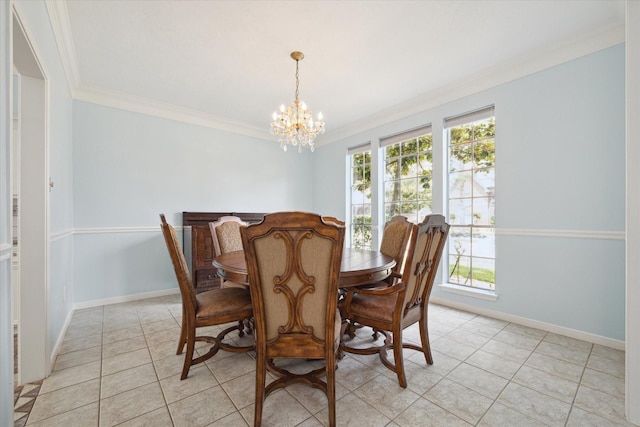 dining area featuring a notable chandelier, ornamental molding, light tile patterned floors, and baseboards