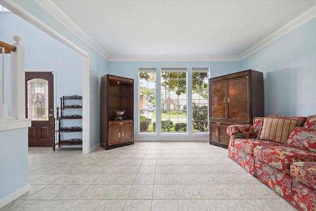 living area with baseboards, light tile patterned flooring, and crown molding